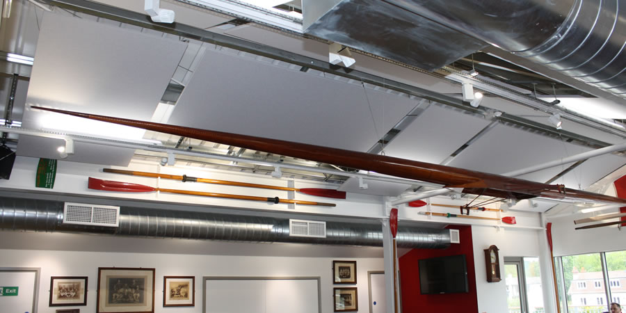 Acosutic panels suspended from the ceiling